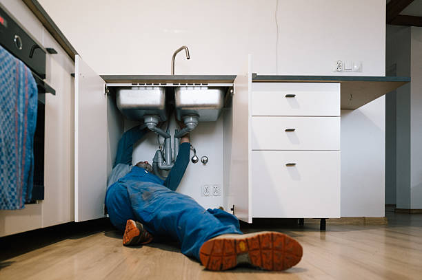 Professional Drain Cleaning technician working in Belfair, WA